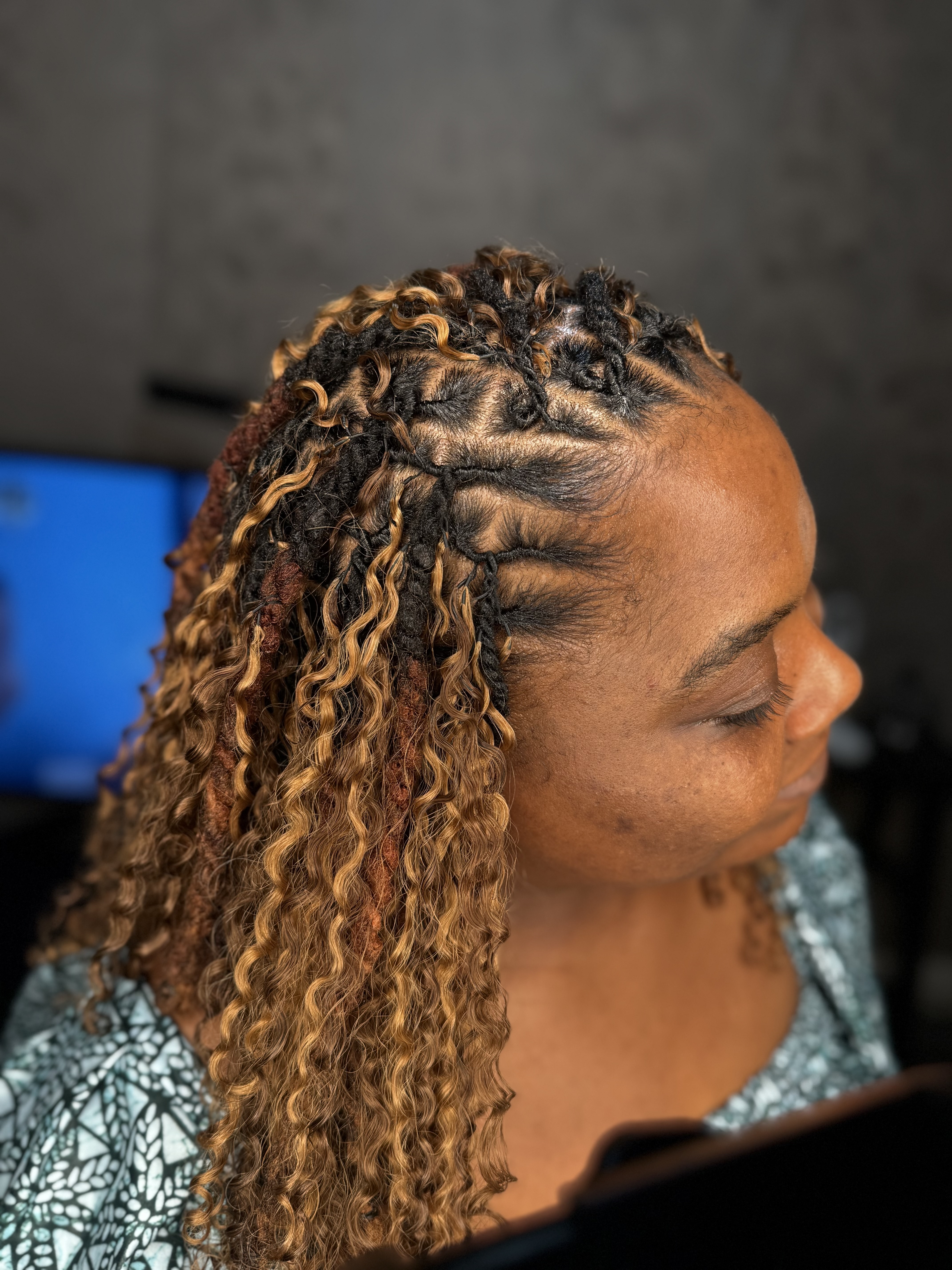 Loc Retwist with boho curls